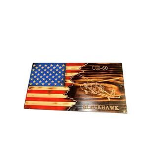 Blackhawk UH – 60 and American flag carved on board 16in by 11in